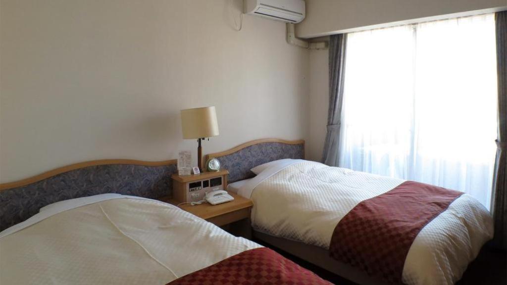 Hotel Tenchikaku Хитати Экстерьер фото