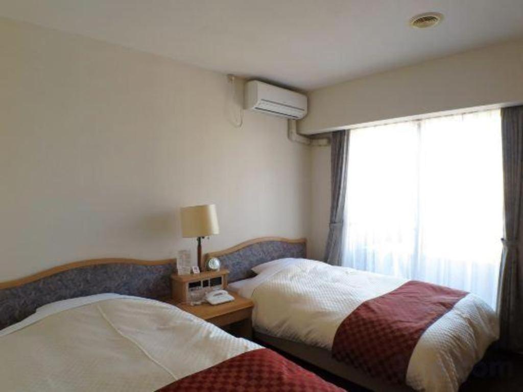 Hotel Tenchikaku Хитати Экстерьер фото