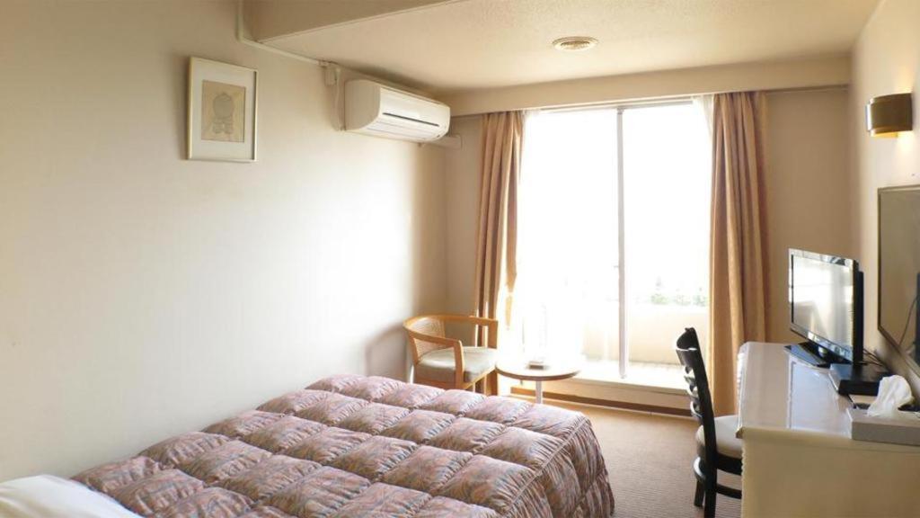 Hotel Tenchikaku Хитати Экстерьер фото