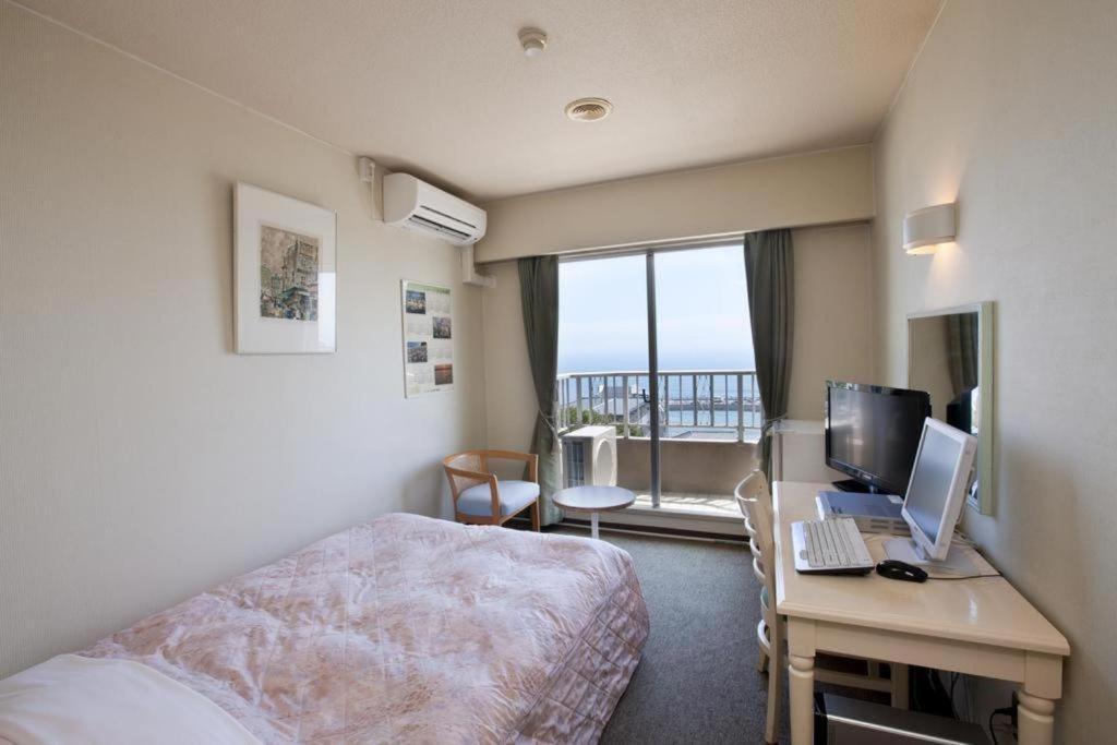 Hotel Tenchikaku Хитати Экстерьер фото