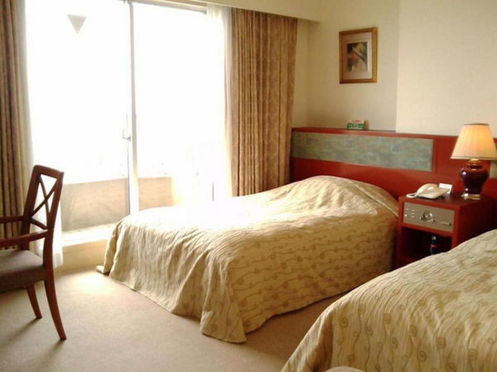 Hotel Tenchikaku Хитати Экстерьер фото